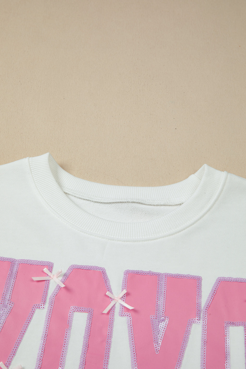 Black Bow Sequin XOXO Letter Graphic Exposed Seam Baggy Sweatshirt