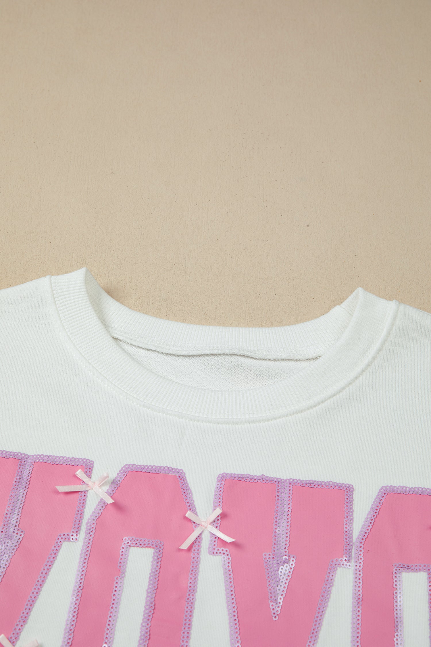 Black Bow Sequin XOXO Letter Graphic Exposed Seam Baggy Sweatshirt